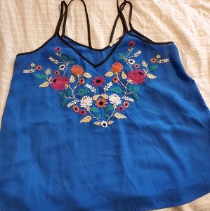 Blue tank top with floral embroidery